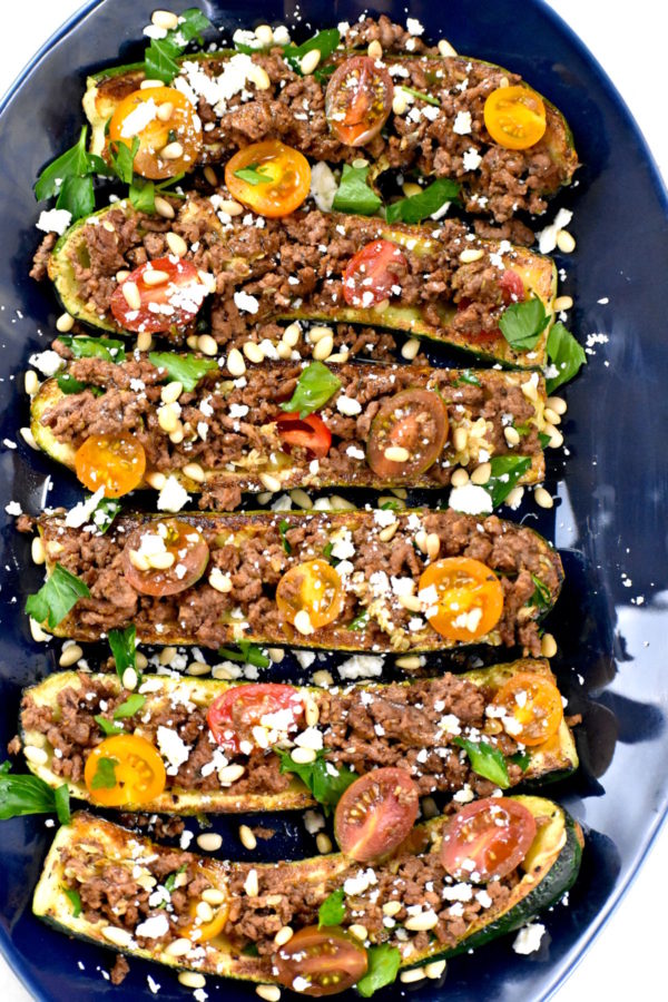 Zoomed out view of the platter of zucchini boats.