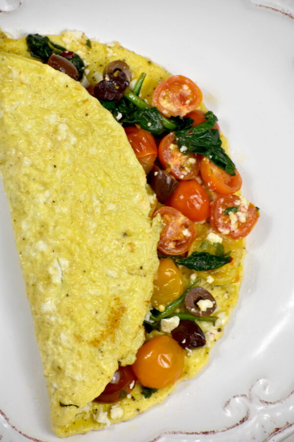 Add some Mediterranean flair to your breakfast rotation with this easy and tasty Mediterranean Omelette! Beautiful in its simplicity and fresh flavors, this is a breakfast you’ll keep coming back to.