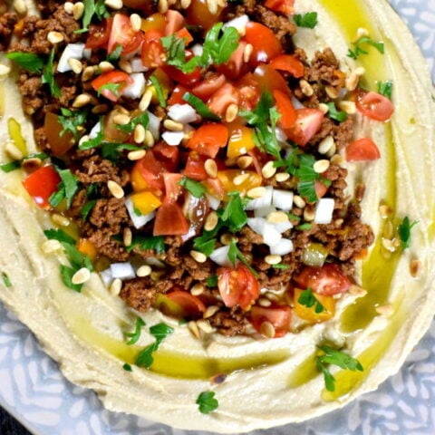 featured image for loaded layered hummus dip.