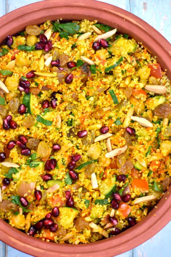 Give regular couscous a colorful makeover. This Moroccan Couscous recipe is a great side dish that goes with a variety of mains.