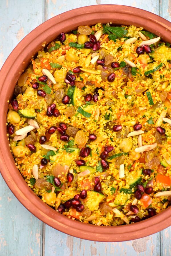 Give regular couscous a colorful makeover. This Moroccan Couscous recipe is a great side dish that goes with a variety of mains.