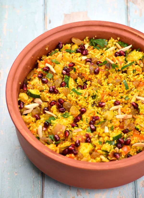 Give regular couscous a colorful makeover. This Moroccan Couscous recipe is a great side dish that goes with a variety of mains.