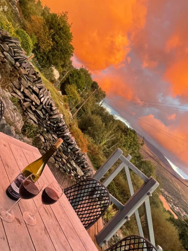 What to Eat in England - glass of wine overlooking snowdon mountain