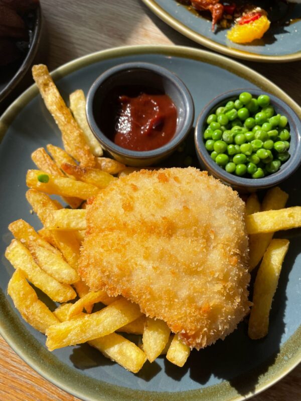 What to Eat in England - child serving of fish and chips